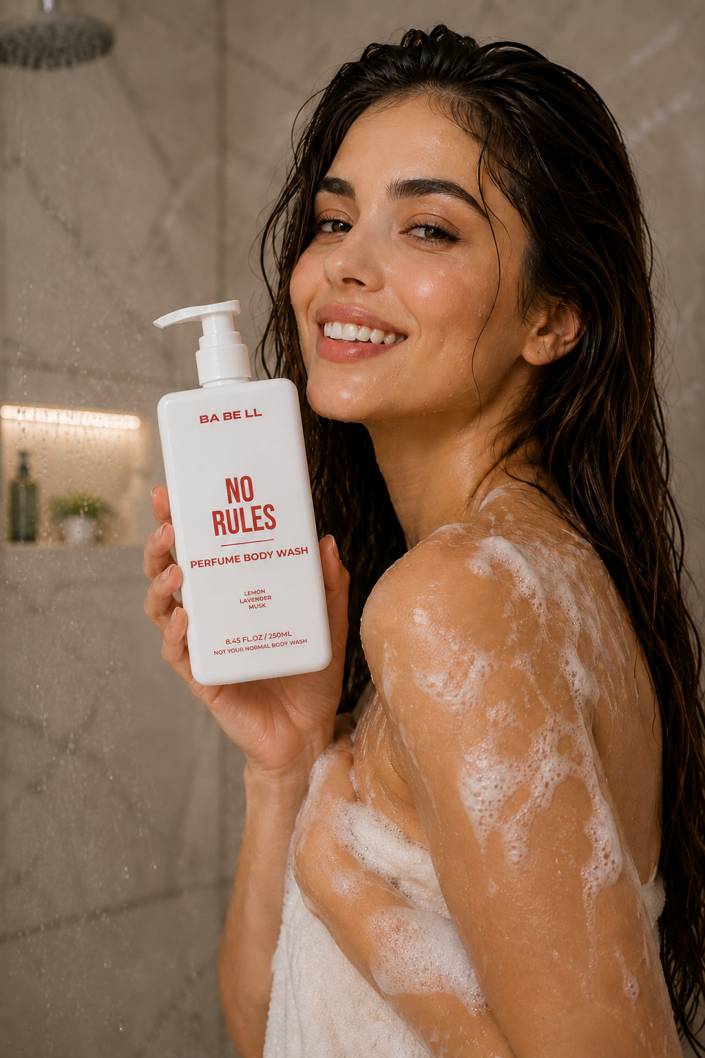 Woman in the shower holding Babell No Rules perfume body wash, 250ml.