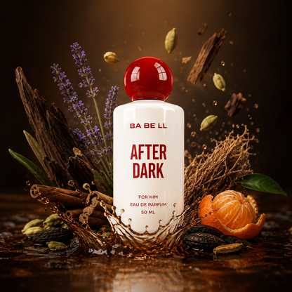 A 50 ml bottle of BA BE LL After Dark Eau De Parfum, featuring a white bottle and a glossy red cap, surrounded by artistic ingredients like cinnamon, lavender, cardamom, and a mandarin orange on a dark, reflective surface.