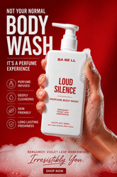 Loud Silence perfume body wash held in a lathered hand, showing its rich foam.