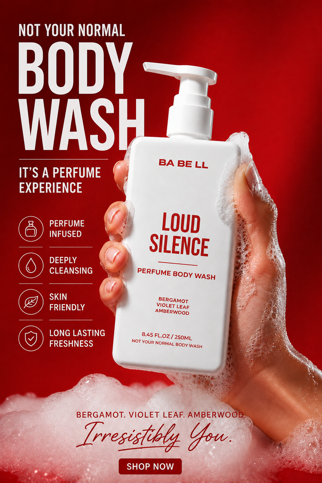 Loud Silence perfume body wash held in a lathered hand, showing its rich foam.