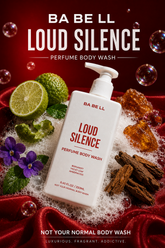 Loud Silence body wash bottle surrounded by bergamot, violet leaf, amberwood in foam.