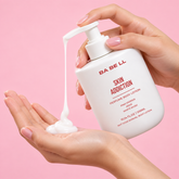 Babell Skin Addiction perfume body lotion pump dispensing white lotion into a palm