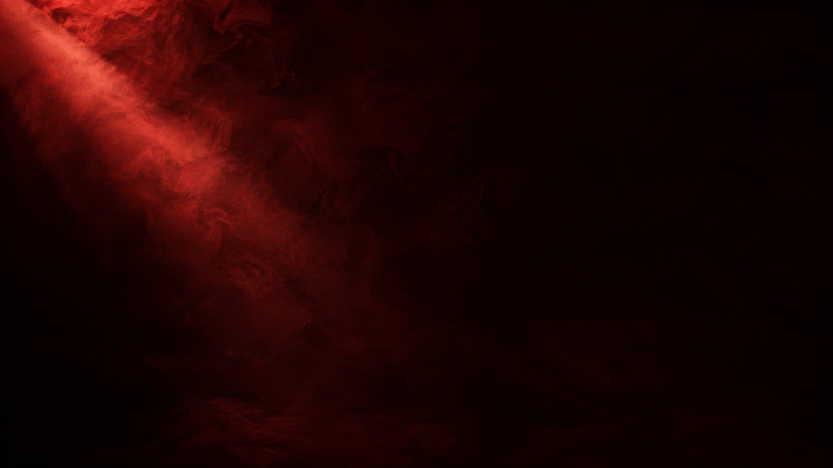 Deep red smoke lit by a single shaft of warm light against near-black