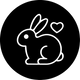 A minimalist white line art icon of a rabbit sitting inside a solid black circle, with a small white heart outline to the upper right of the rabbit.